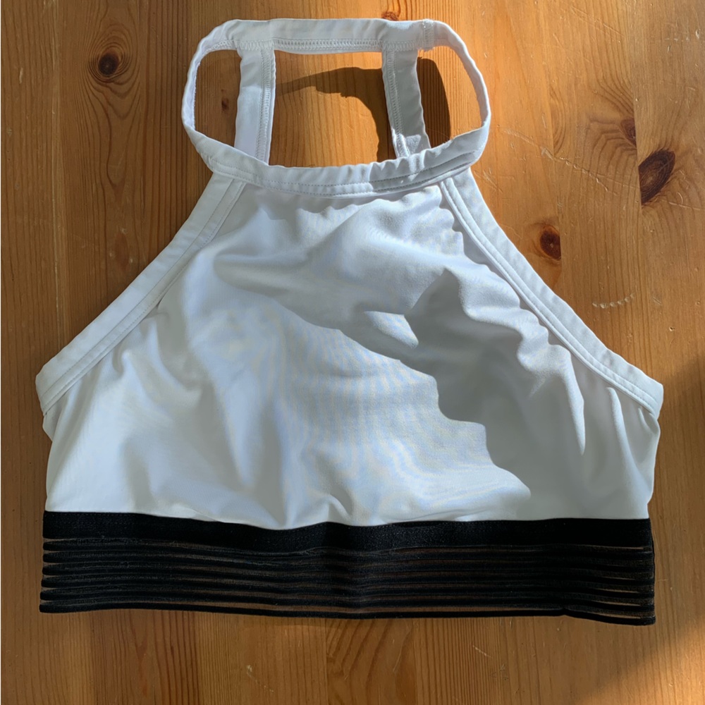 Black and white halter top sports bra with clear detailing